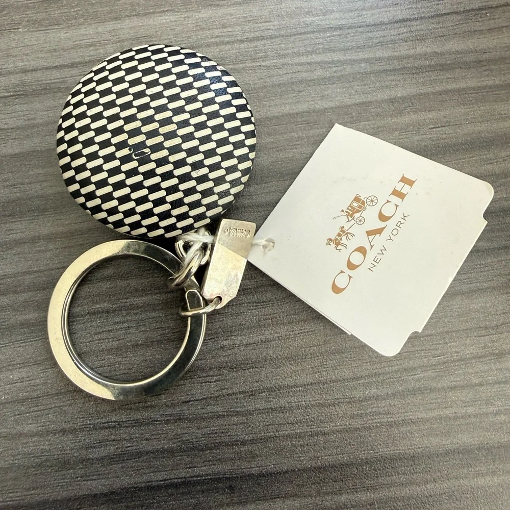 Coach Checkered Black and White Keychain with Pink Logo flashlight